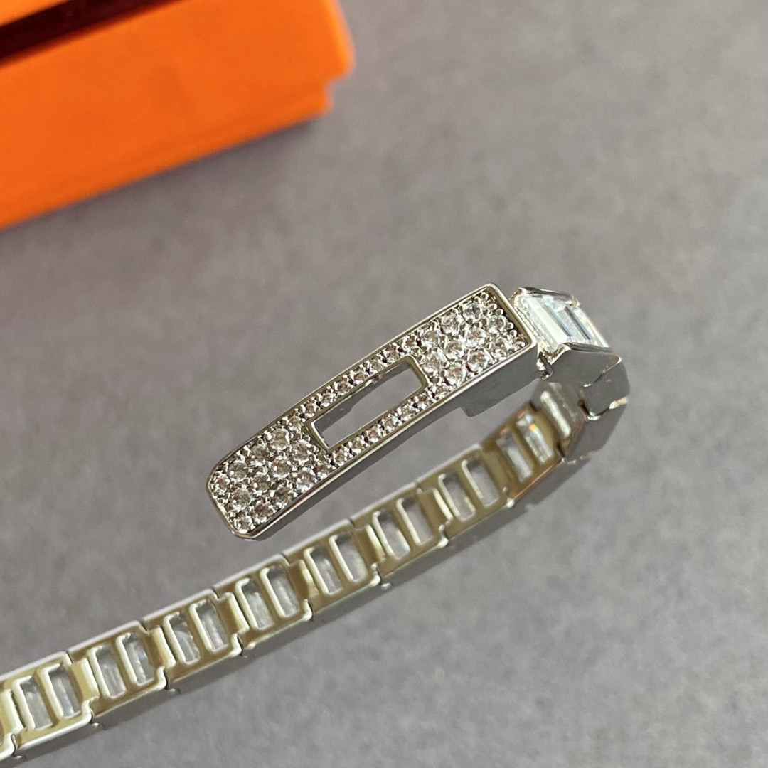 H**mes button trapezoid di*m*nd bracelet