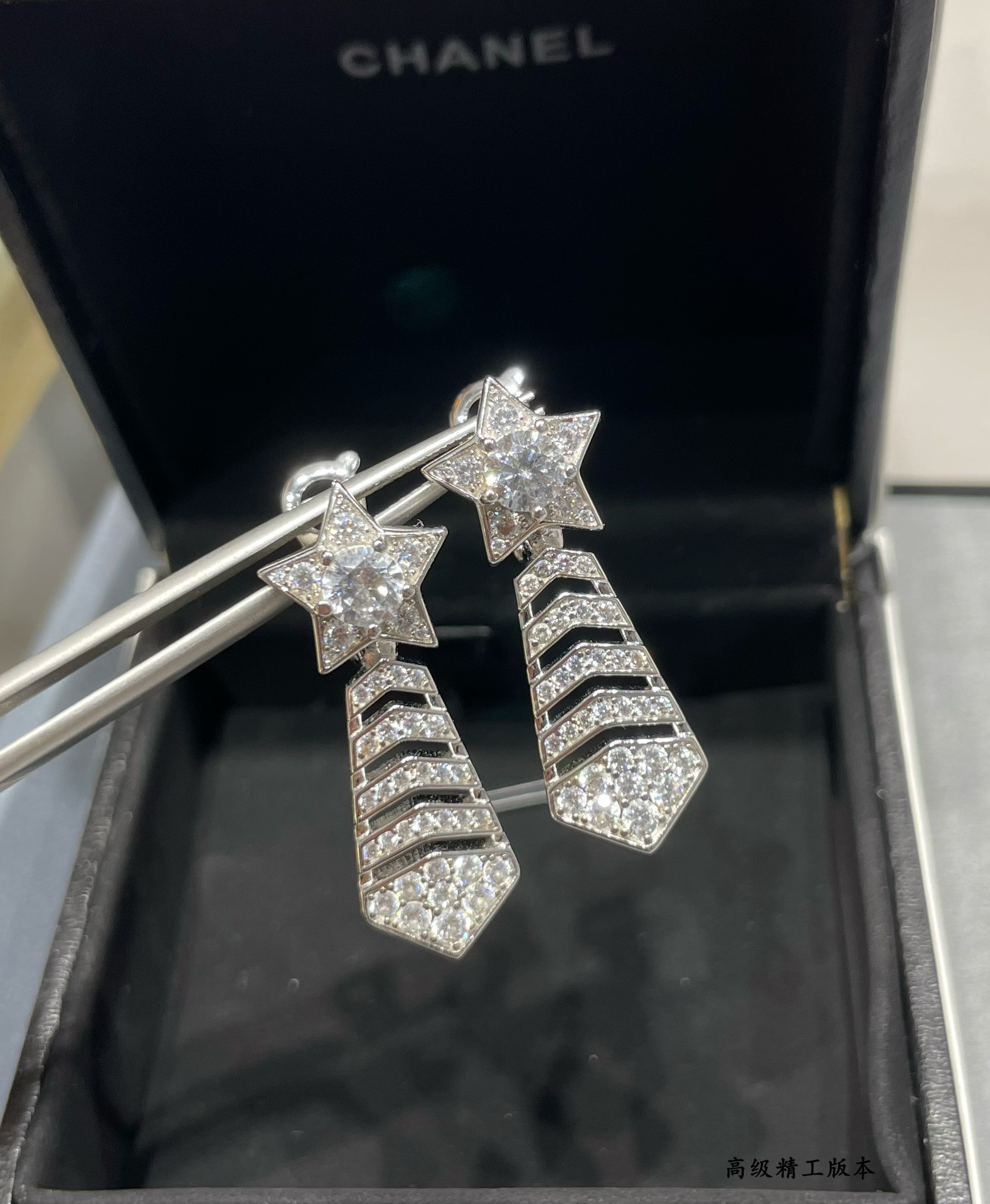 Ch*el comet earrings