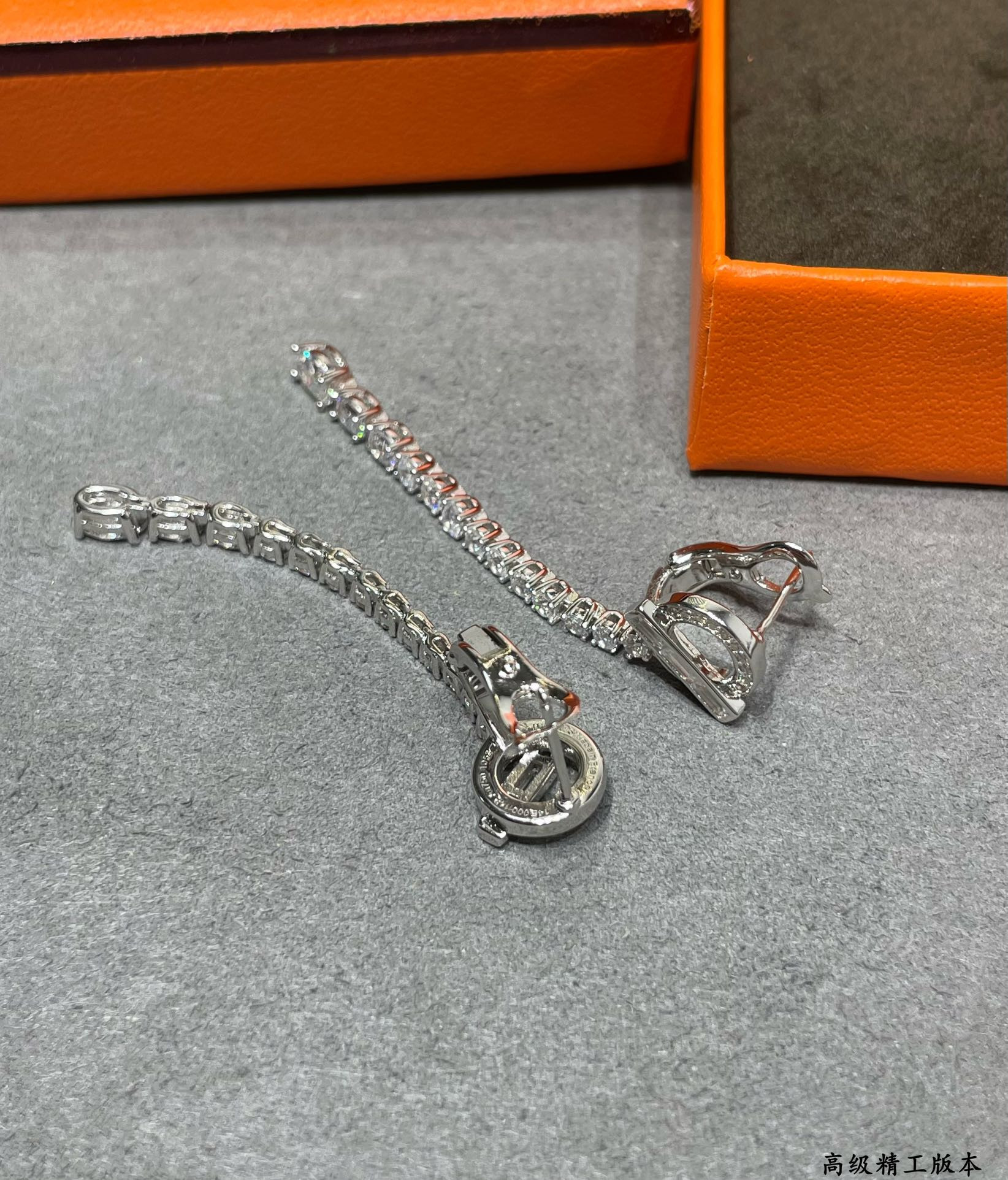 H**mes ot fully di*m*nd-encrusted earrings
