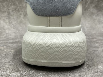 ale*d*r M*Q*en oversized light blue sneaker