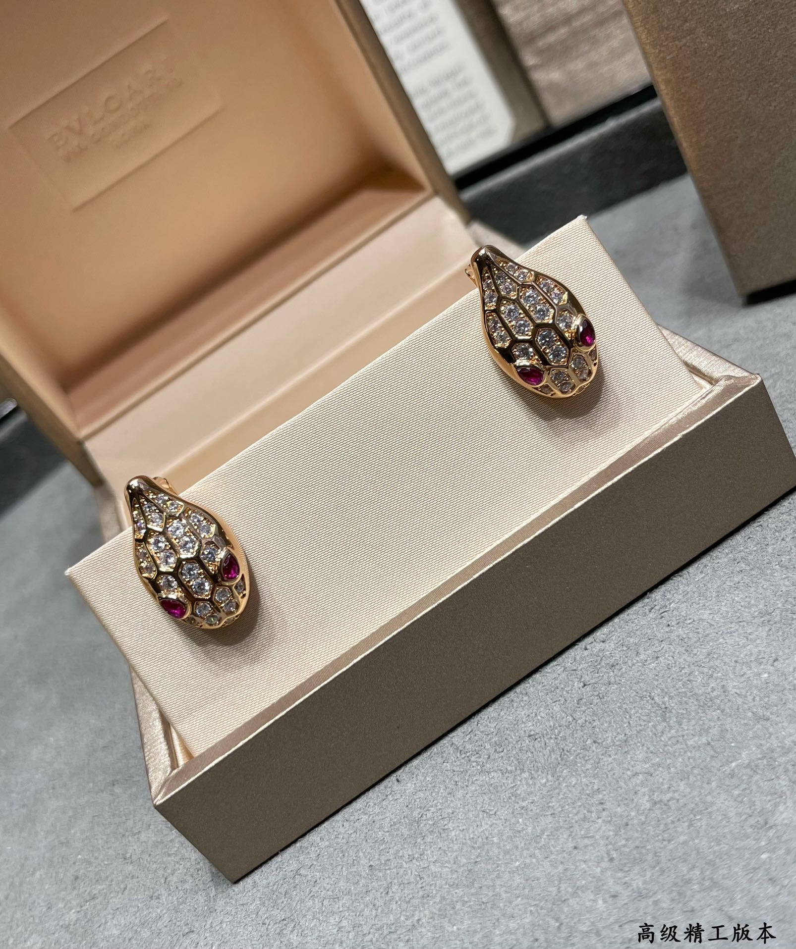 B*l*ai full of snakes earrings