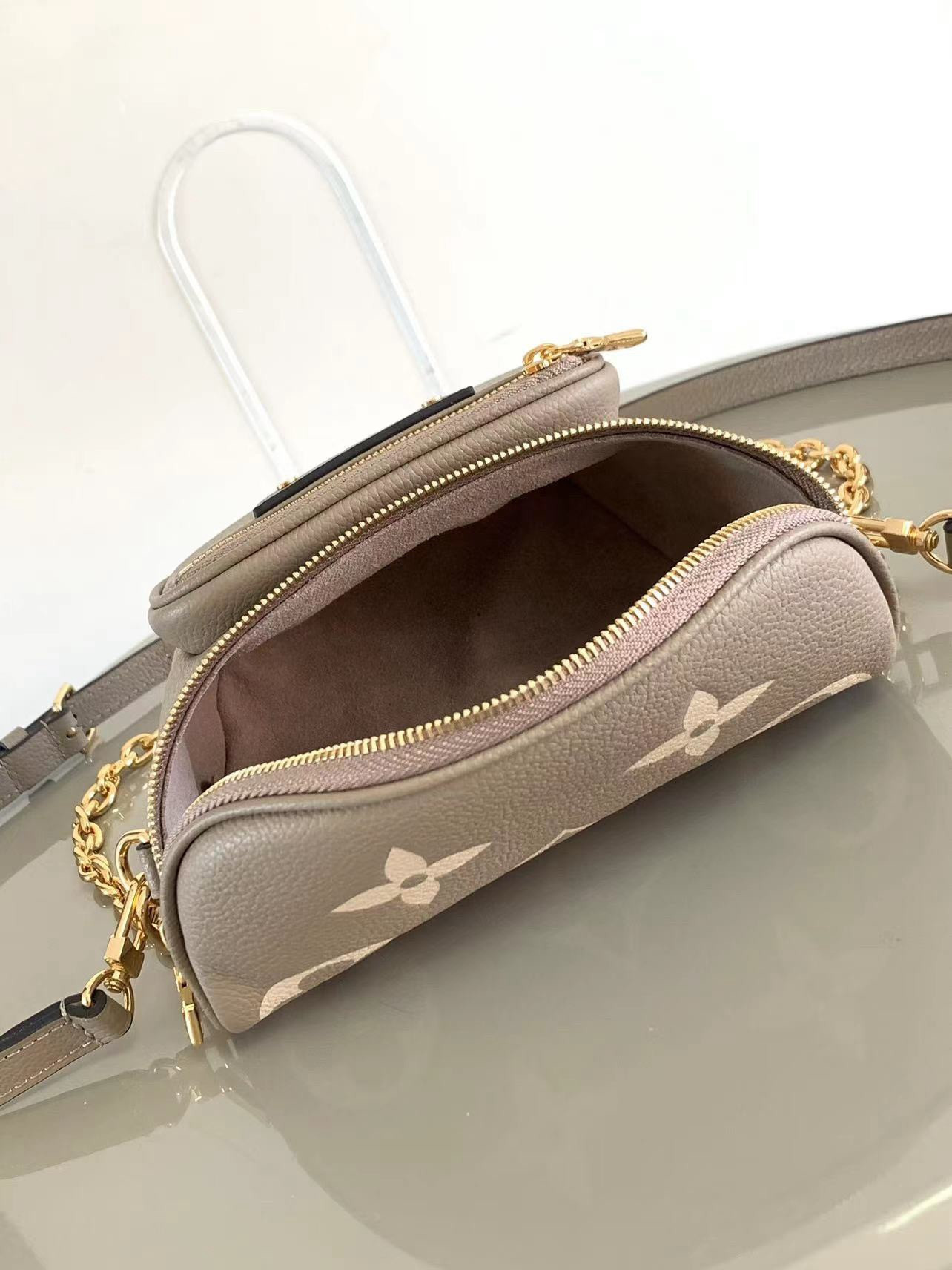 LV Mini Bumbag M83219 6.7 x 4.7 x 3.7 inches