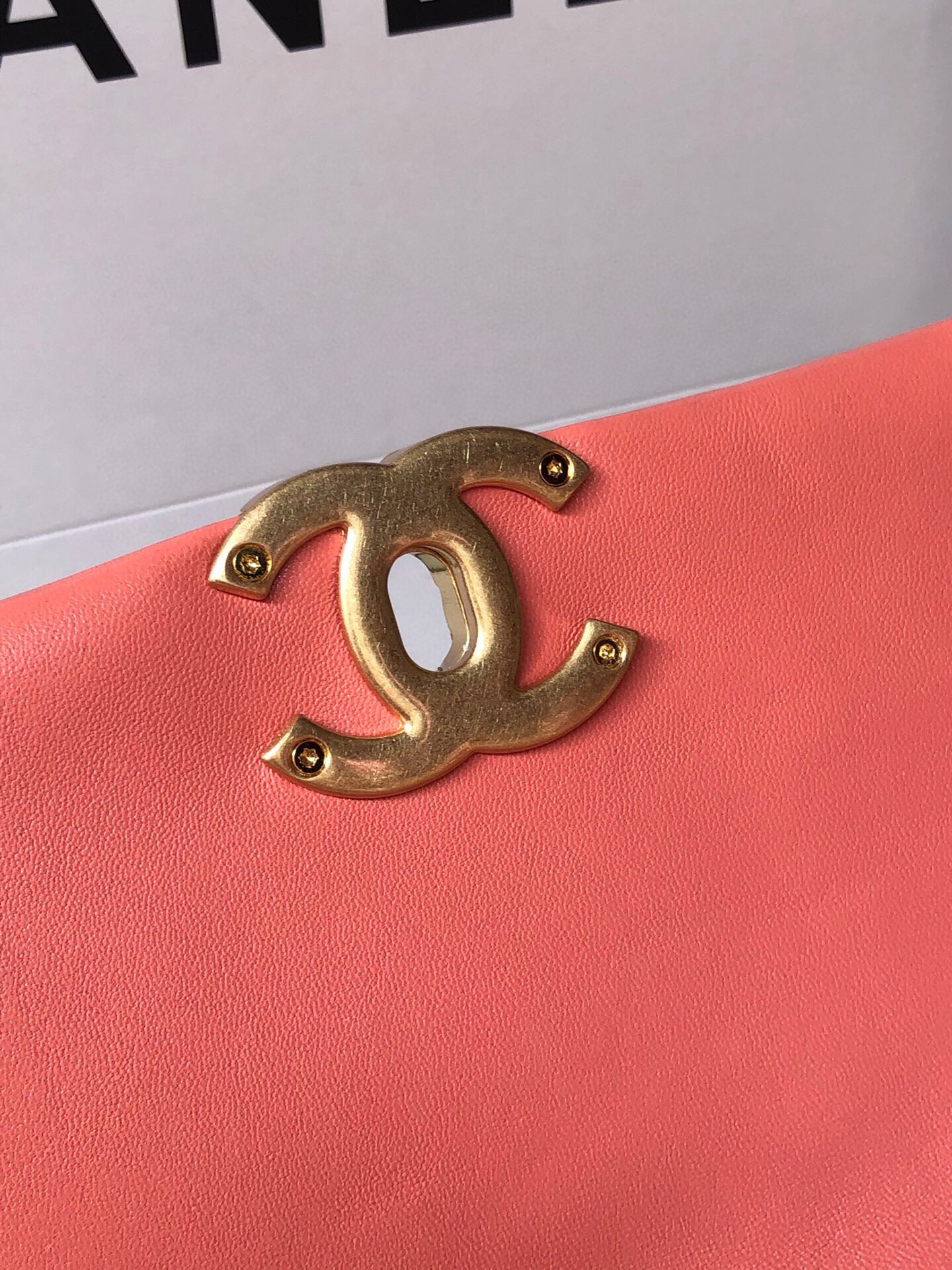 Ch*el 19 handbag shiny pink gold-tone, silver-tone & ruthenium-finish metal 6.2 × 10.1 × 3.5 in