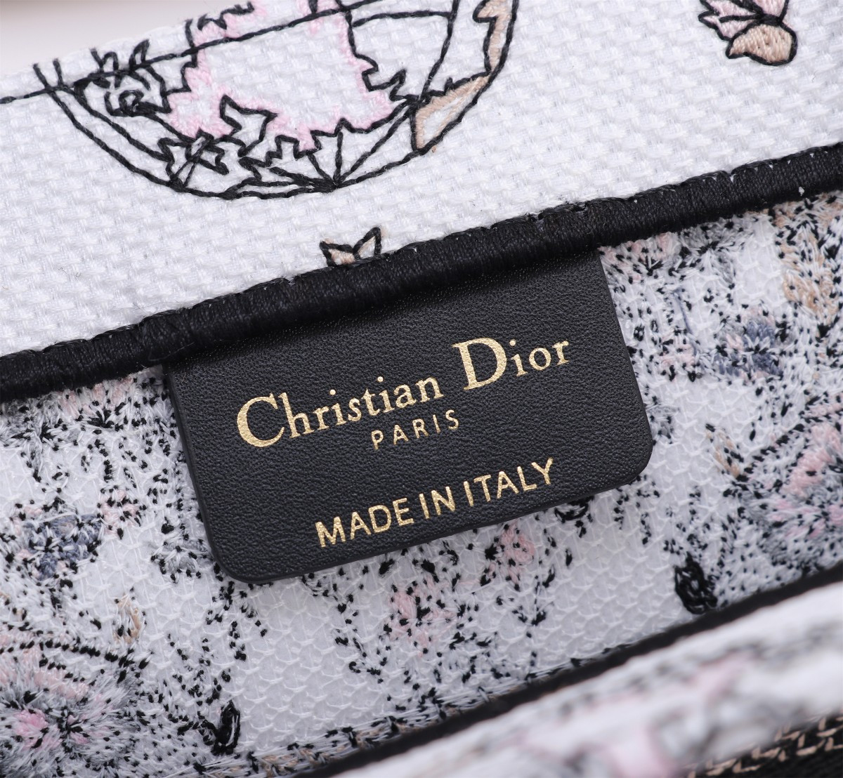medium D*or book tote white and pastel pink butterfly around the world embroidery 14 x 11 x 6.5 inches