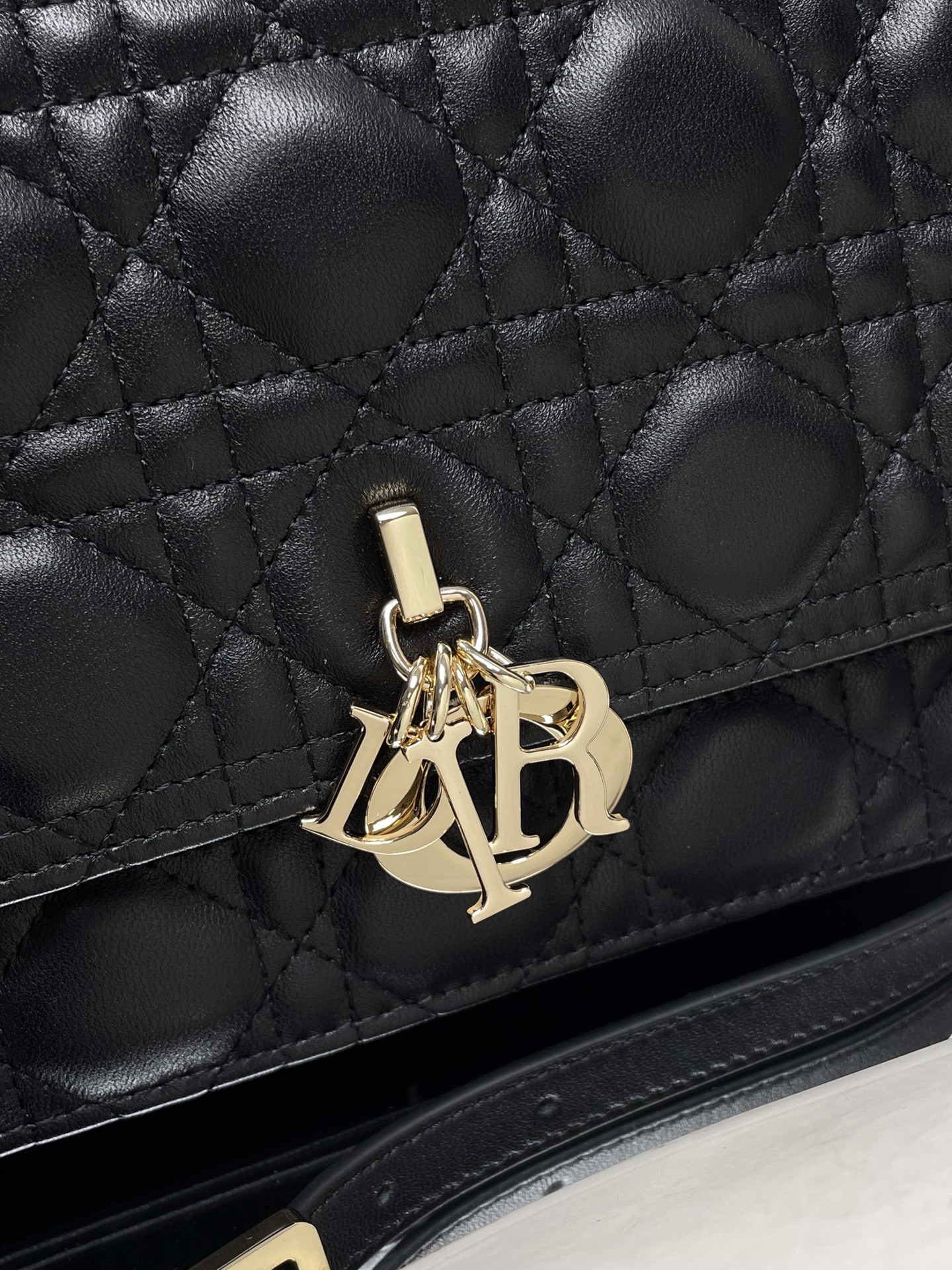 my D*or top handle bag black 9.5 x 5.5 x 3 inches