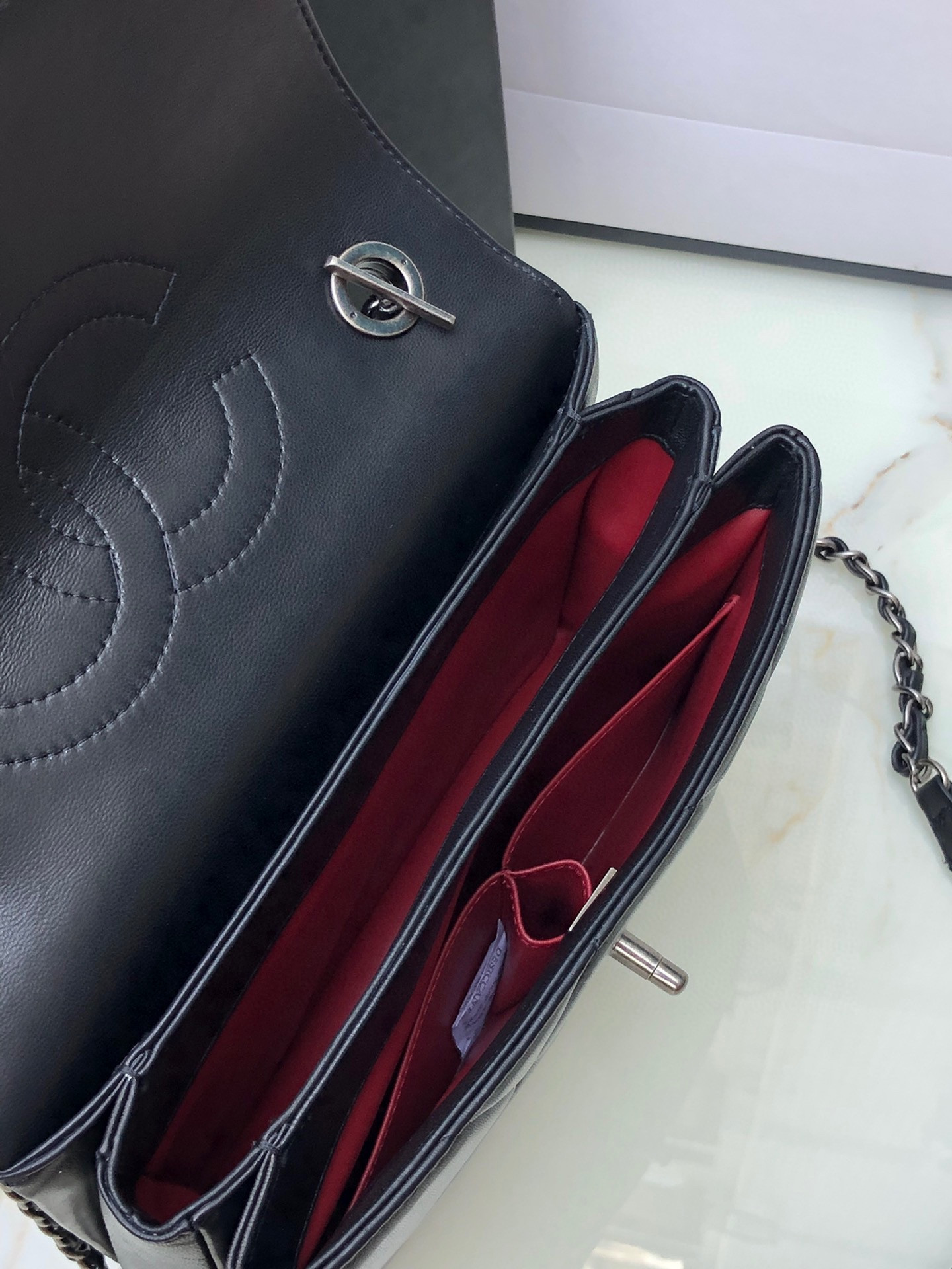 Ch*el flap bag with top handle 6.6 × 9.8 × 4.7 in