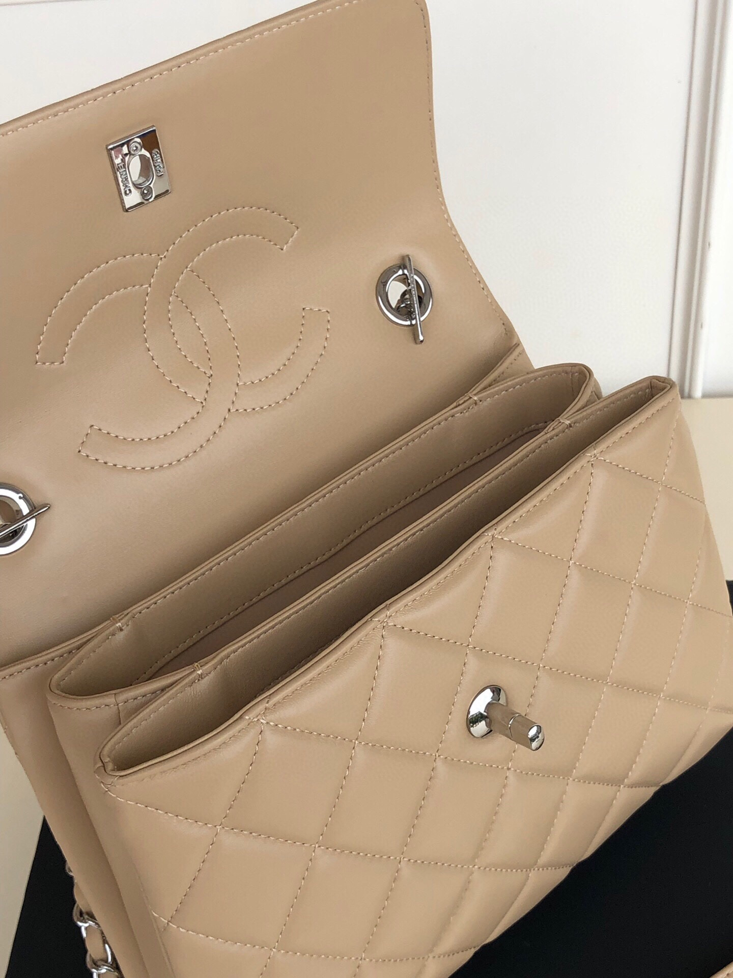 Ch*el flap bag with top handle 6.6 × 9.8 × 4.7 in