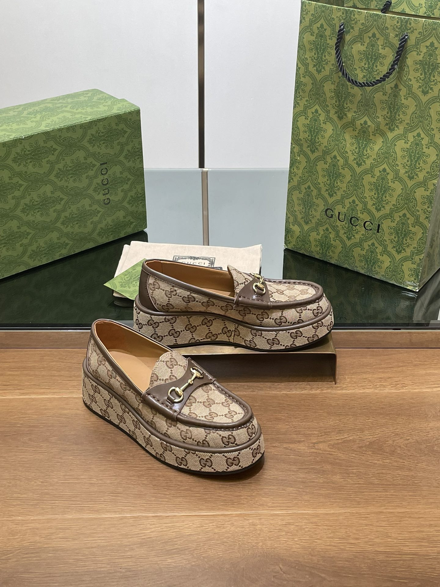 ua G*u*i horsebit wedge loafer