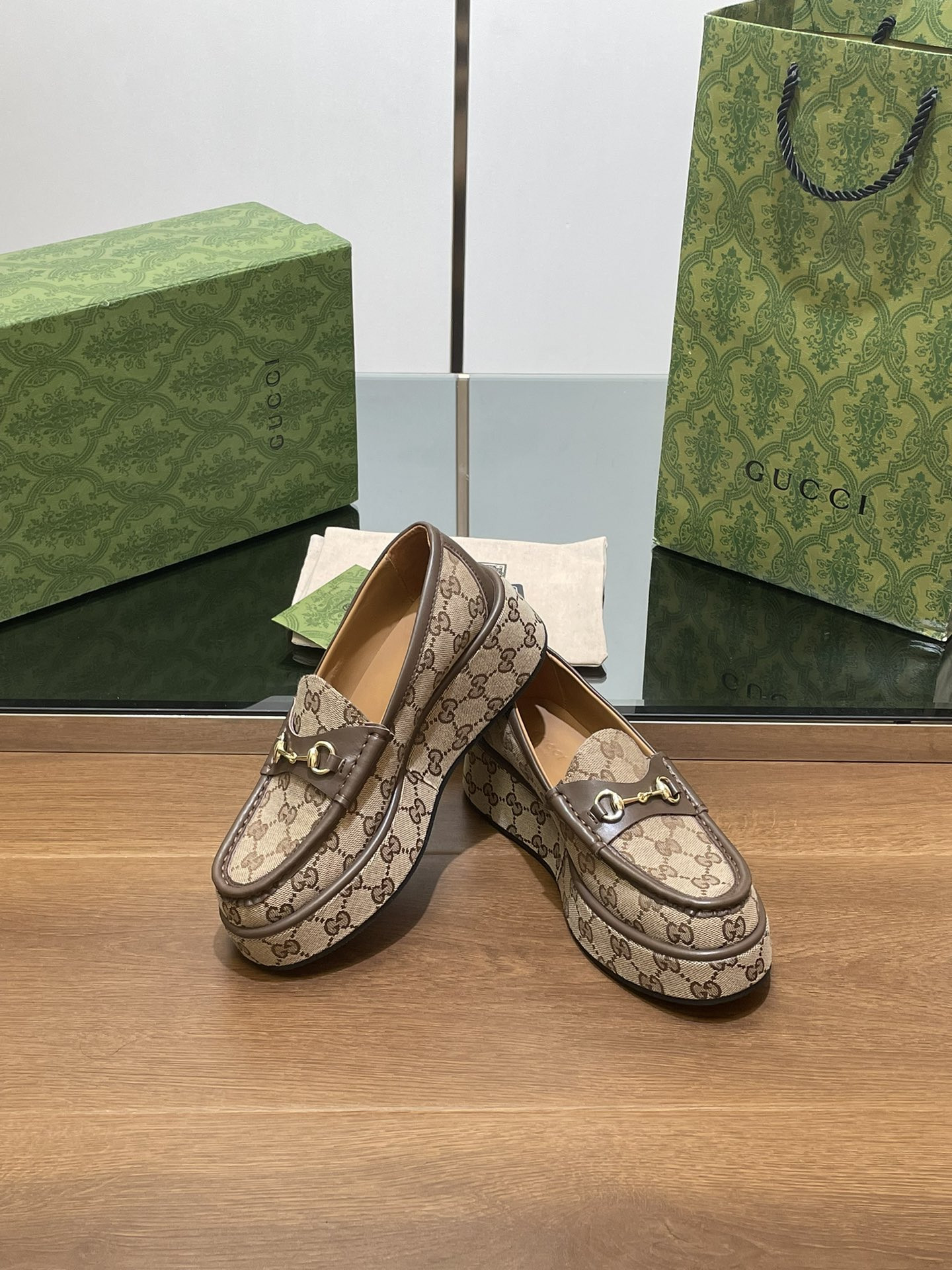 ua G*u*i horsebit wedge loafer