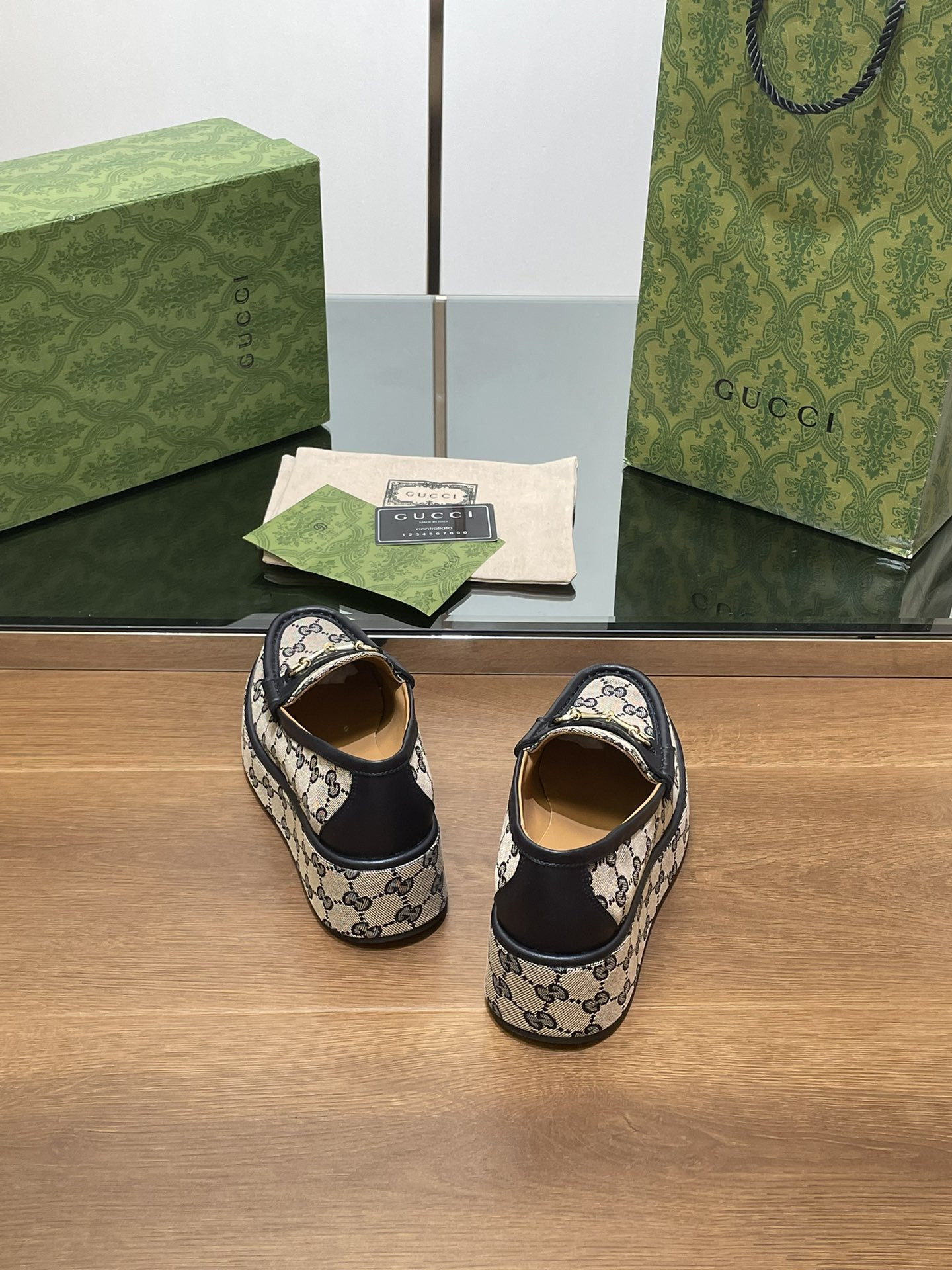 ua G*u*i horsebit wedge loafer